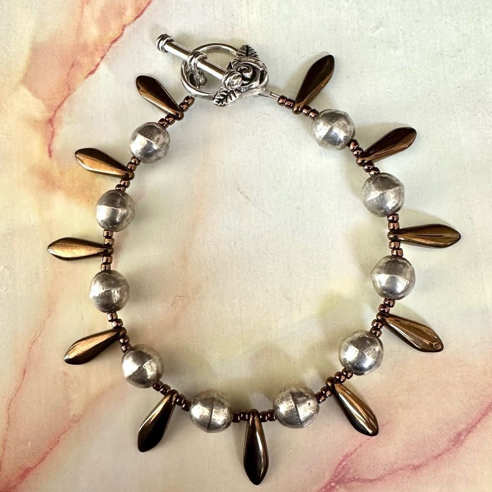 Silver and copper tone bracelet
